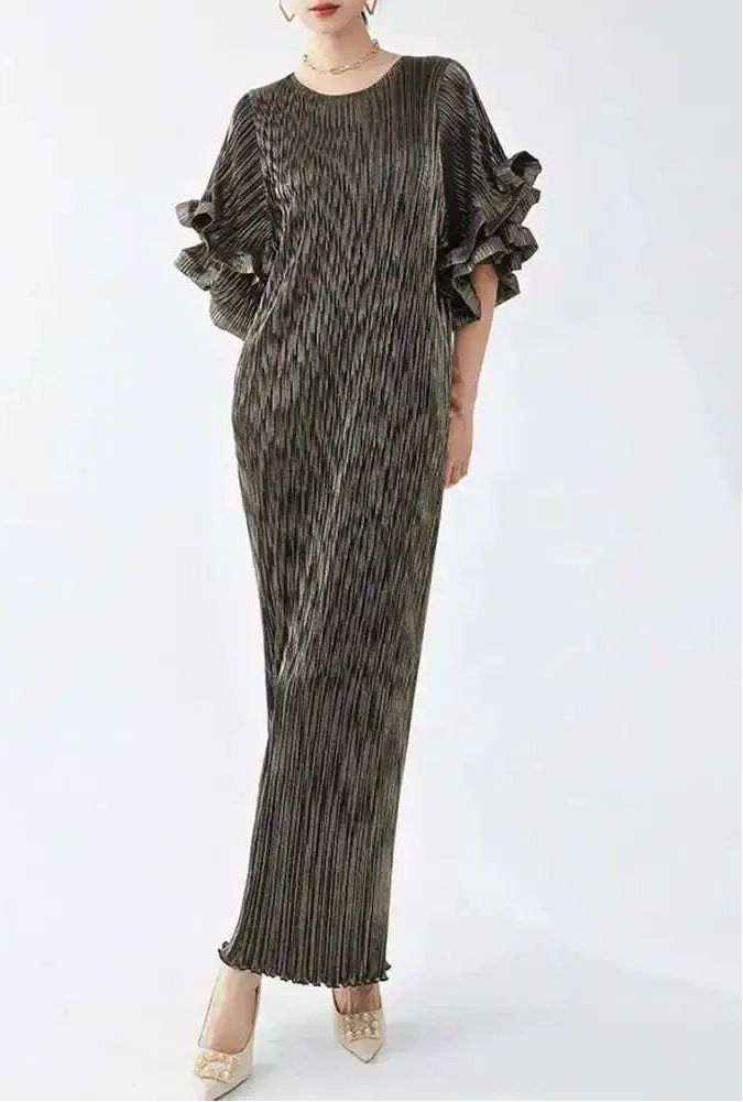 Long, dark green dress with ruffled sleeves on a white background