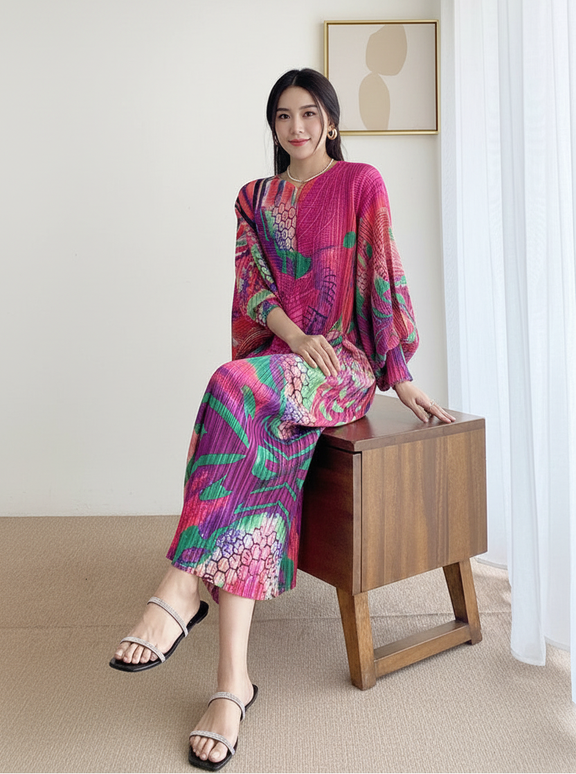 Person wearing a colorful outfit sitting on a wooden bench indoors.