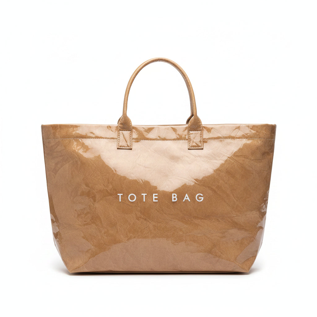 Brown tote bag with 'TOTE BAG' text on a dark surface