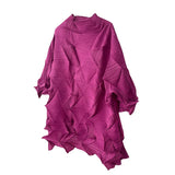 Pink pleated dress on a white background