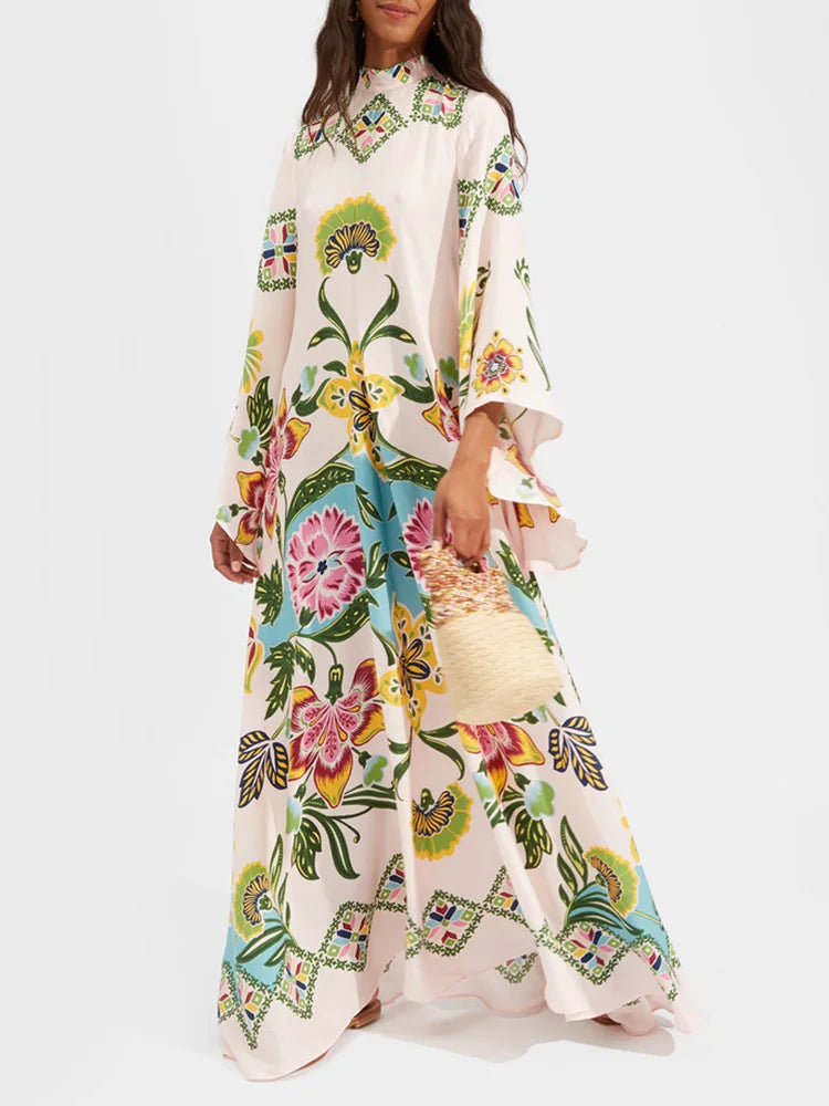 Woman wearing a colorful floral dress on a white background