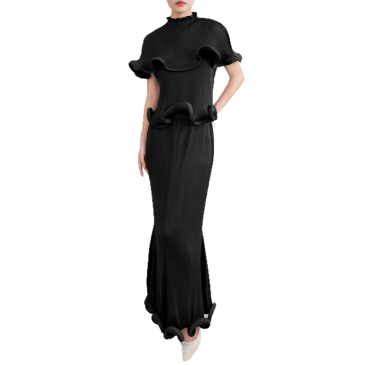 Black ruffled dress on a white background