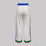 White pants with blue and green trim on a gray background