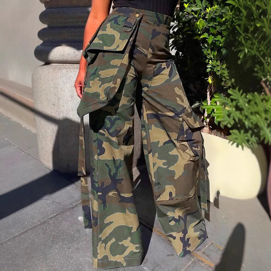 Camouflage pants being worn by a person on a city street.