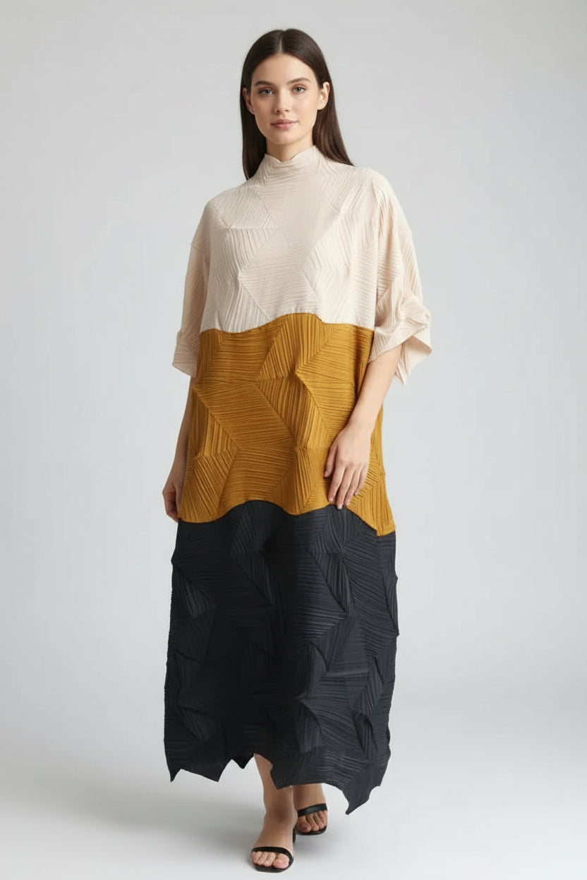Long-sleeve shirt with a geometric pattern in beige, yellow, and black on a white background