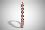 Jewelry with pink gemstones on a blurred background
