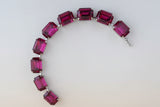 Jewelry with red gemstones on a blurred background