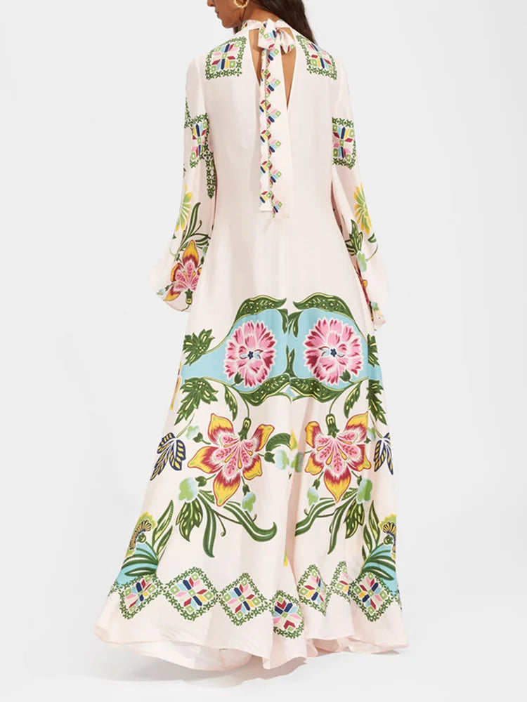 Long floral dress with colorful patterns on a white background