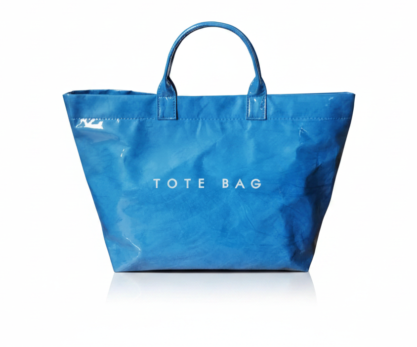 Blue tote bag with 'TOTE BAG' text on a gray background